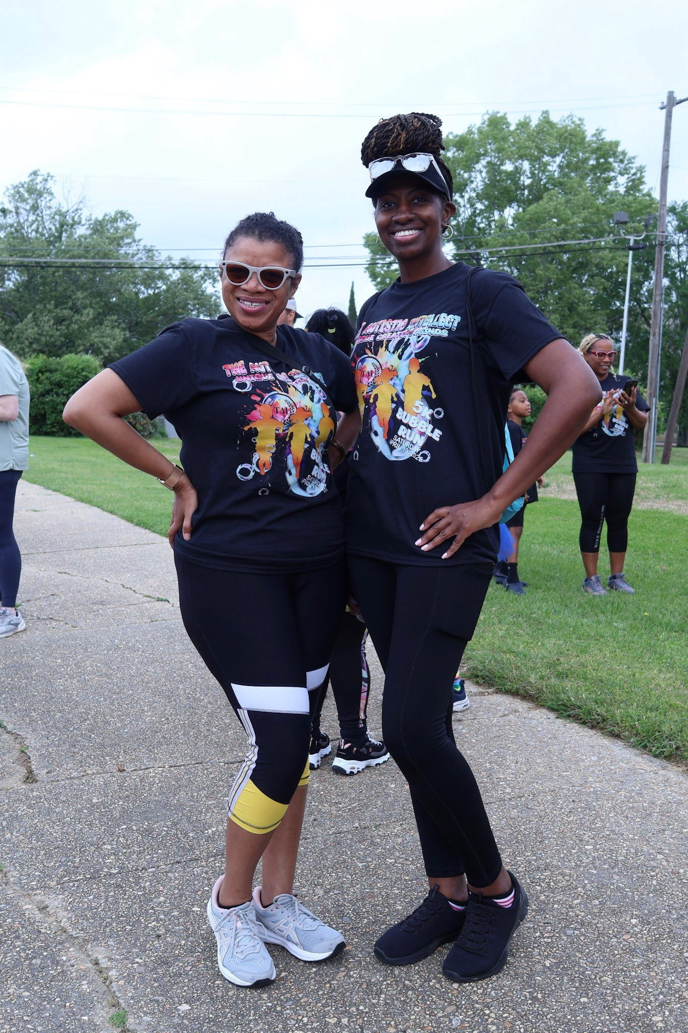 Two participants at the Autistic Intellect 5K Bubble Run